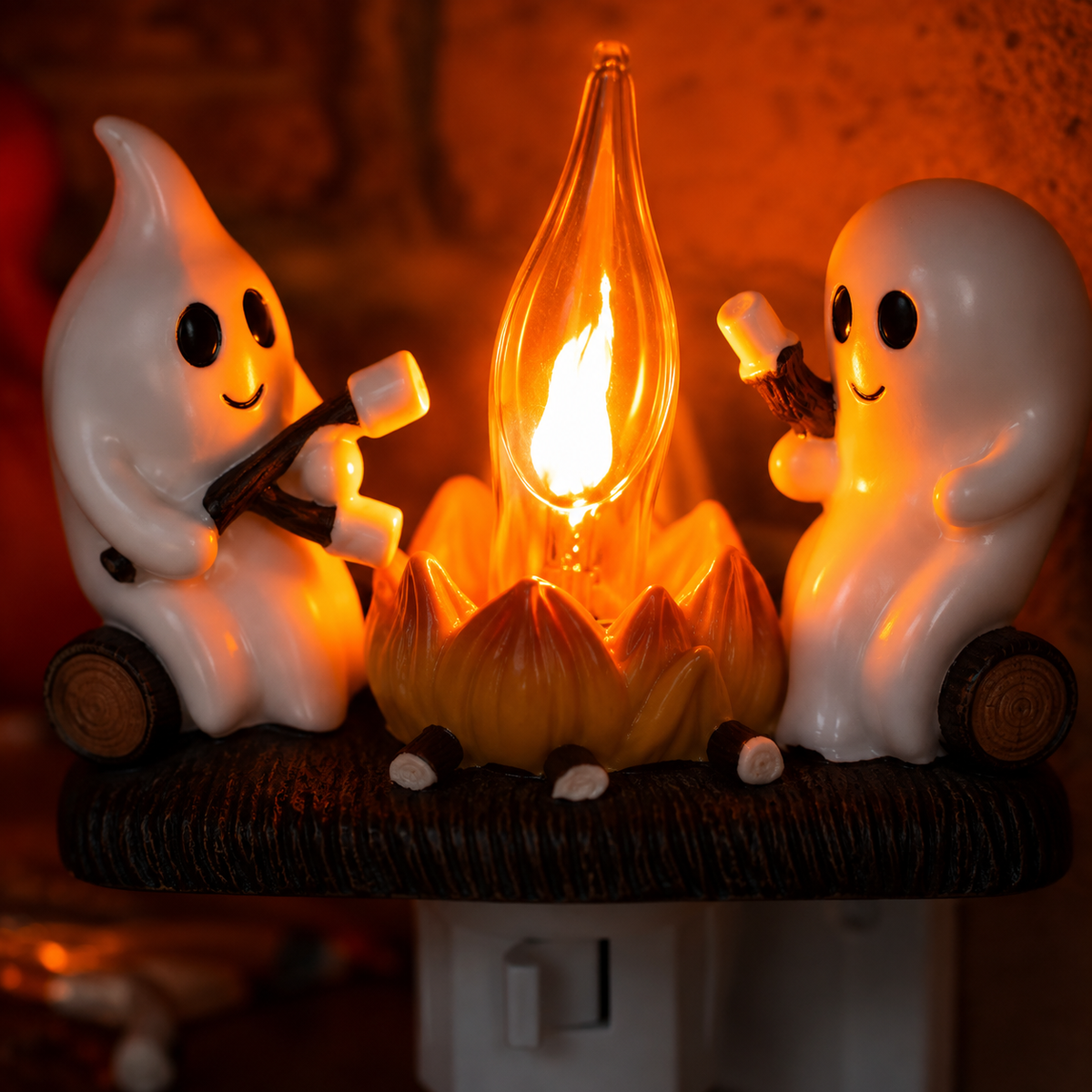 Ghost Campfire Night Light glowing in warm orange light