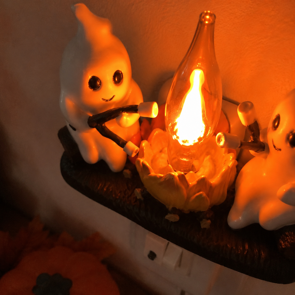 Halloween ghost night light in a cozy room